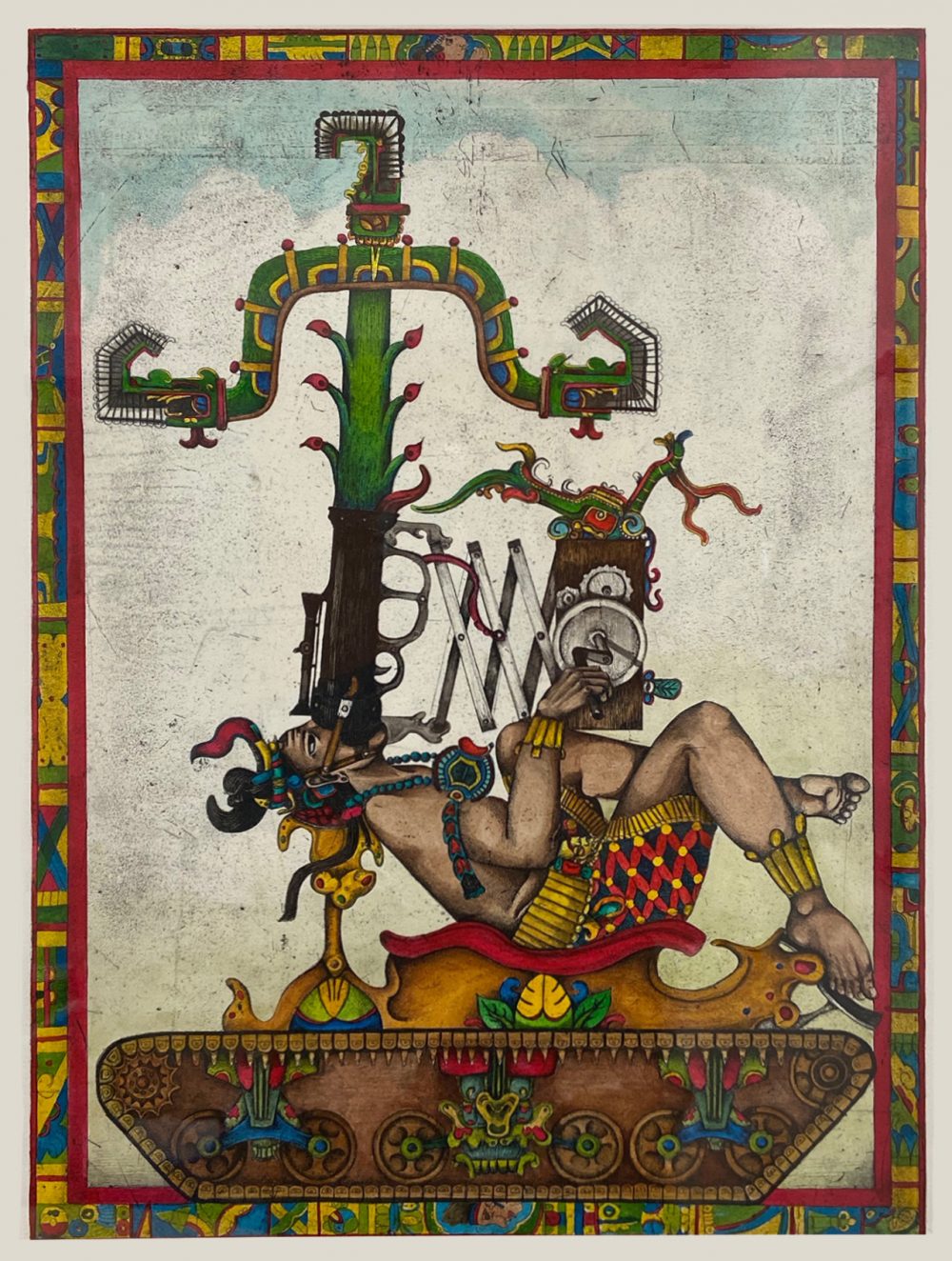 Intalglio print that has been hand colored. A male figure dressed in the style of indigenous people of Central America is laying back on an elaborately decorated platform. His body is seen in profile. The base of the platform looks like the base of a tank, with gears and a tread. Protruding from the mouth of the man is what looks like the barrel and scope of a weapon, and a tall plant grows out of that barrel. In the background is a cloudy sky with a band of light blue at the top. A colorful border frames the image. Predominant colors in the work include green, red, yellow, brown and blue.