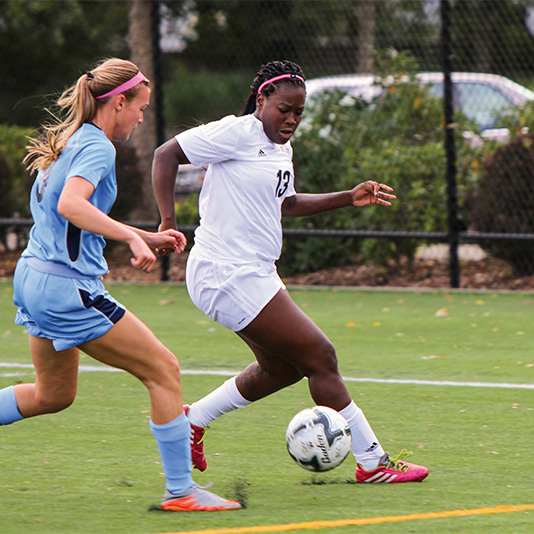 Student playing in a soccer game