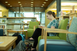Student in Comfortable Seating at the Rock Creek Library