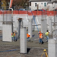 Contractors pour the slab-on grade for the parking garage in early March 2013.