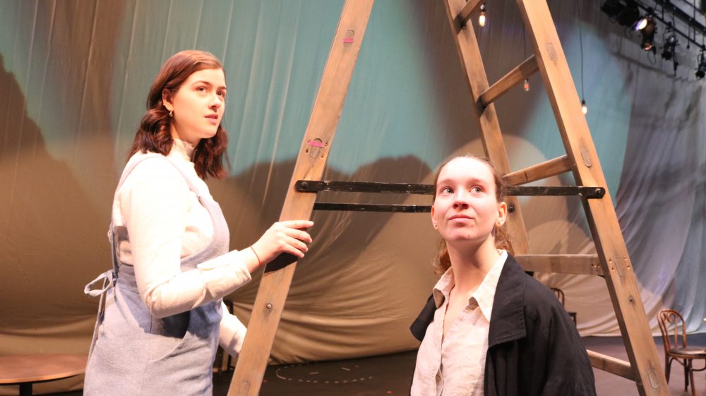 Sophia Ekdahl (as Emily Webb) and Sarah Deyoung (as Editor Charlie Webb)