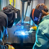 Welding in one of the booths.