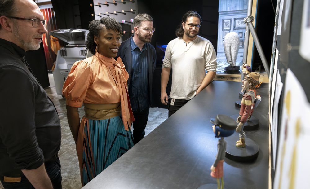 At LAIKA’s studios. From left, Multimedia Instructor Eric Fauske, PCC President Dr. Adrien Bennings, Chief Marketing and Operations Officer David Burke and Production Supervisor Jesselee Kahaloa