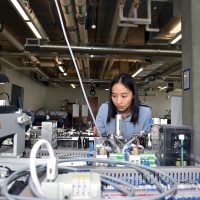Emily Peng at the Willow Creek mechatronics Lab where Quick Start is hosted.