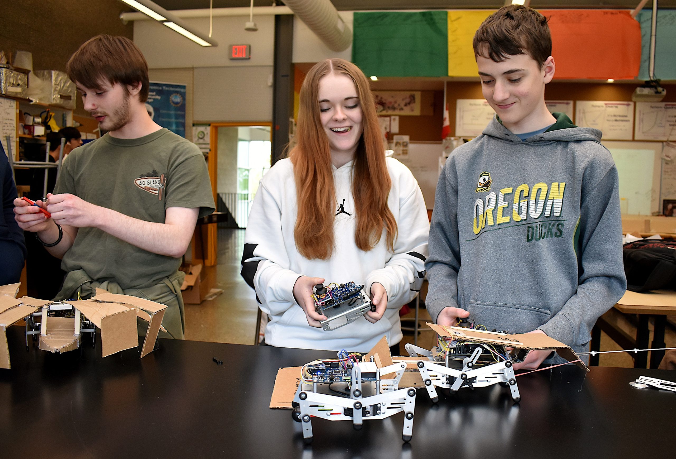 Forest Grove students building robots.