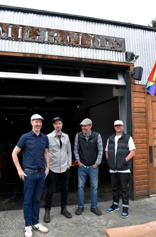 Migration brewing co-owners enjoy a moment outside at Glisan location.