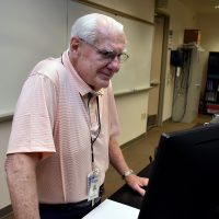 Bill Manley at computer