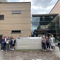 Exterior of OHSU with Bioscience staff.