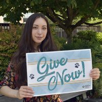 Gina with sign