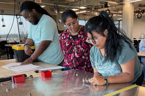 Students working in a manufacturing class