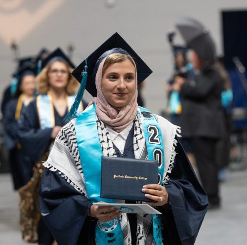 Photo of a student at Commencement