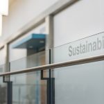 Sustainability text on glass railing