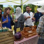 People shopping at farm stand