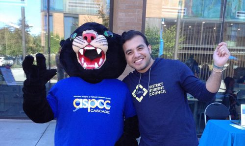 Student with Poppie the Panther